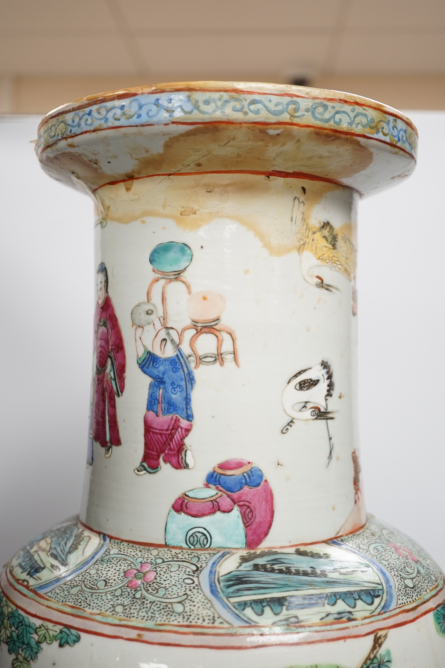 A large 19th century Chinese famille rose rouleau vase, 64cm. Condition - rim and neck have discoloured restored, otherwise fair